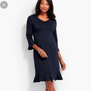 NWT. Navy Shift Ponte 3/4 sleeve dress with ruffle detail at hem and sleeve.